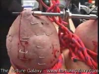 Brutal punishment fetish movie features brunette cougar getting her tits pierced and bloody